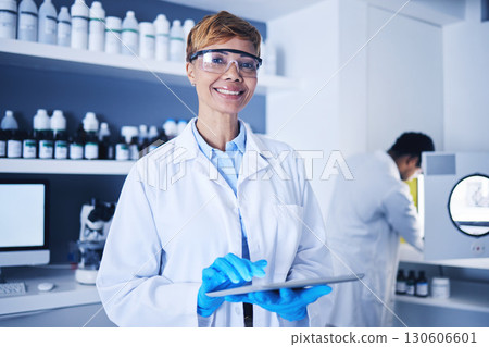 Scientist, black woman and working on tablet in laboratory for planning, innovation and research. Portrait, happy science worker and digital medicine for development, data analysis and biotechnology 130606601