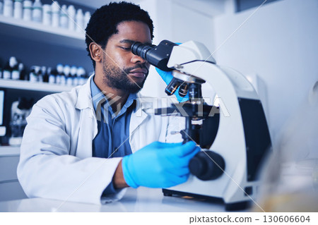 Microscope, science laboratory and black man research medical analysis, review and biotechnology. Scientist, microbiology and worker study investigation, healthcare innovation or planning expert test Microscope, science laboratory and black man research medical analysis, review and biotechnology. Scientist, microbiology and worker study investigation, healthcare innovation or planning expert test 130606604
