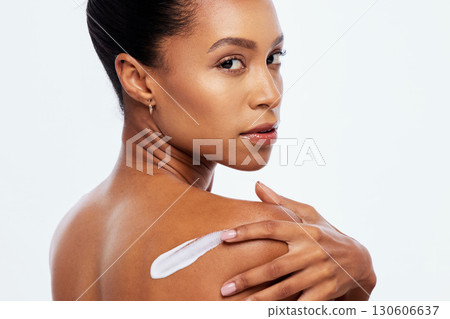 Beauty, skin cream and body care portrait in studio for dermatology, cosmetics and natural glow. Aesthetic model person with luxury spa product on back with free space isolated on a white background Beauty, skin cream and body care portrait in studio for dermatology, cosmetics and natural glow. Aesthetic model person with luxury spa product on back with free space isolated on a white background 130606637