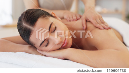 Back, massage and hands on woman with care in spa, wellness resort or calm luxury service to relax in peace. Body, therapist and press muscle to release stress in healthy meditation or healing Back, massage and hands on woman with care in spa, wellness resort or calm luxury service to relax in peace. Body, therapist and press muscle to release stress in healthy meditation or healing 130606788