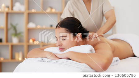 Woman, spa bed and hands for shoulder massage, care and professional treatment for muscle, stress and wellness. Girl, masseuse and holiday for physical therapy, spine and recovery at luxury resort 130606796