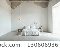 Minimalist Bedroom Interior with Exposed Concrete Ceiling and Simple White Bedding in Bright Natural Light, Striking Contrast Texture 130606936