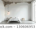 Minimalist White Bedroom Interior with Raw Concrete Ceiling, Suspended Lights, Bed, Side Tables, and Natural Window Light 130606953