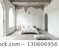 Minimalist White Bedroom Interior with Arched Doorways and Raw Concrete Ceiling Design, Simple Bed, Wooden Chair, and Relaxing Lighting 130606956