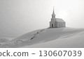 A white church standing in a snowy field 130607039