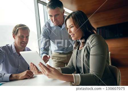 Business people, tablet and team with tech and collaboration in business meeting, corporate and working together. Teamwork, check digital information or document, wifi internet and communication Business people, tablet and team with tech and collaboration in business meeting, corporate and working together. Teamwork, check digital information or document, wifi internet and communication 130607075