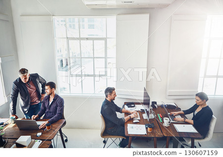 Teamwork, office and business collaboration by at a startup company or agency with a working team. Management, staff and coworking group or workforce of professional colleagues at the workplace 130607159