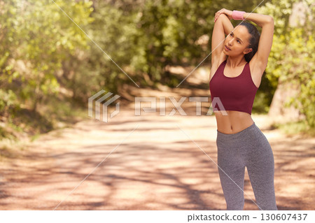 Woman, stretching and exercise in park for wellness, training and healthy lifestyle with mockup. Sports person warm up body, arms and outdoor workout for fitness, energy and running goals in nature 130607437
