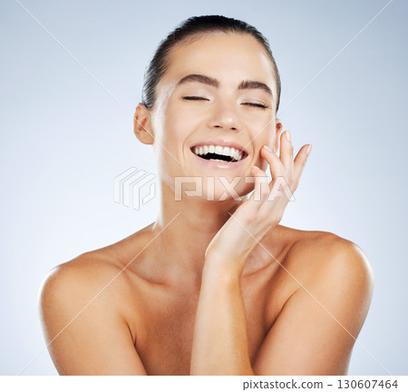 Woman, happy and big smile with teeth for dental wellness, cosmetics oral care and luxury beauty glow. Model, facial happiness and skincare health or dentist veneers whitening in white background Woman, happy and big smile with teeth for dental wellness, cosmetics oral care and luxury beauty glow. Model, facial happiness and skincare health or dentist veneers whitening in white background 130607464