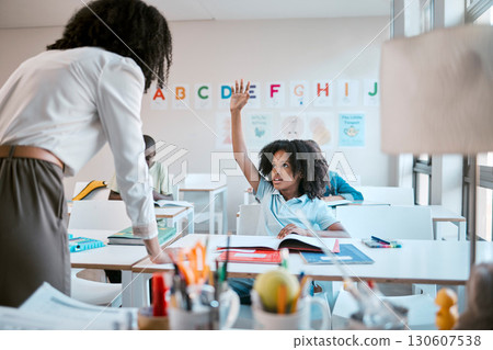 Question, school and education with a black girl student hand raised in a classroom to ask or answer her teacher. Kids, asking and learning with a young female child in class to study for growth Question, school and education with a black girl student hand raised in a classroom to ask or answer her teacher. Kids, asking and learning with a young female child in class to study for growth 130607538