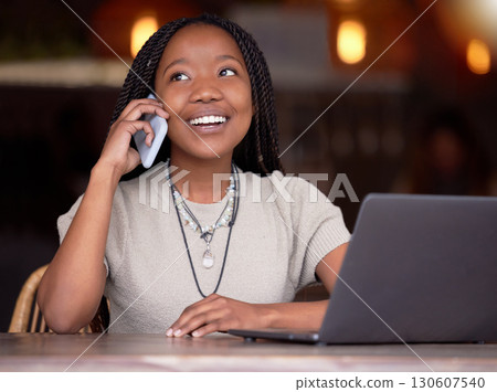 Black woman, phone call and laptop with smile at cafe for communication, conversation or discussion. Happy African American female freelancer smiling and talking on mobile smartphone by computer 130607540