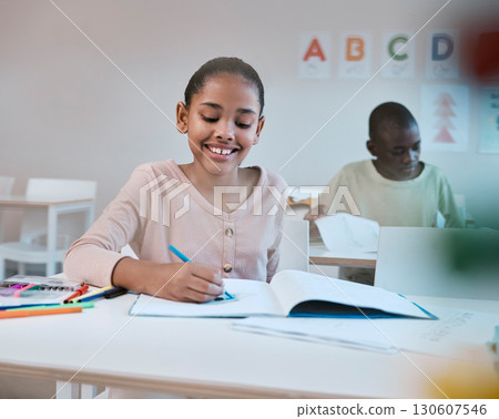 Education, smile and child in classroom learning reading, writing and math in Montessori school in New York. Books, students and happy girl at kid desk in class with notebook studying for future exam 130607546