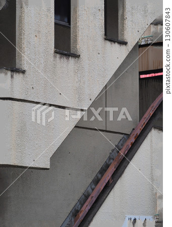 Scenery with stairs: Residential exterior stairs with windbreak 130607843