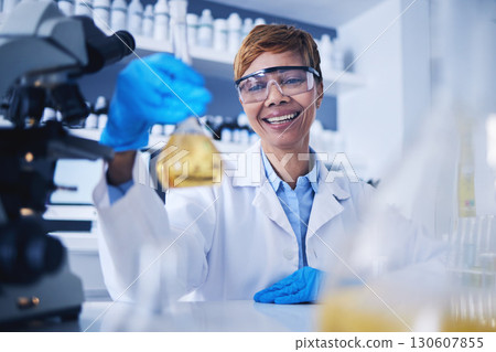 Science, liquid and black woman in laboratory with smile for research, medical study and experiment. Healthcare, pharmaceutical and female scientist with glass beaker for sample, medicine and vaccine Science, liquid and black woman in laboratory with smile for research, medical study and experiment. Healthcare, pharmaceutical and female scientist with glass beaker for sample, medicine and vaccine 130607855