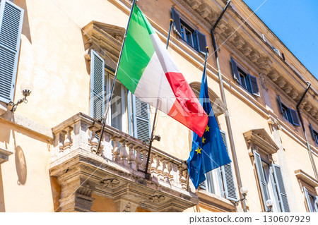Flag of Italy and the European Union on the building 130607929