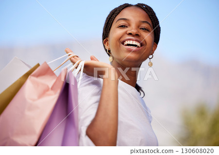 Shopping, black woman and portrait outdoor with retail bags after sale and sales promotion. Happy, smile and excited young person in nature feeling freedom after market deal and fashion mall discount Shopping, black woman and portrait outdoor with retail bags after sale and sales promotion. Happy, smile and excited young person in nature feeling freedom after market deal and fashion mall discount 130608020