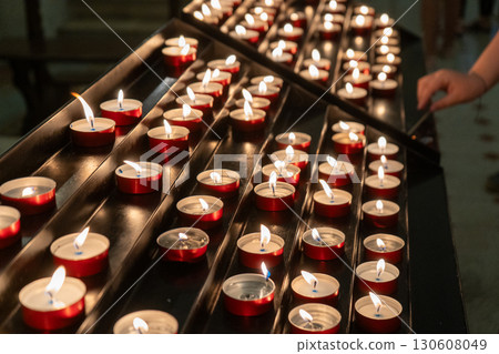 Candles are burning in the church 130608049