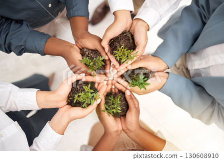 Teamwork, environment and plant with hands of business people from top view for sustainability, earth day or growth. Wellness, support and soil with group for climate change, future and eco friendly Teamwork, environment and plant with hands of business people from top view for sustainability, earth day or growth. Wellness, support and soil with group for climate change, future and eco friendly 130608910