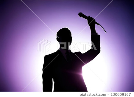 Silhouette of a man in a suit holding a microphone 130609167