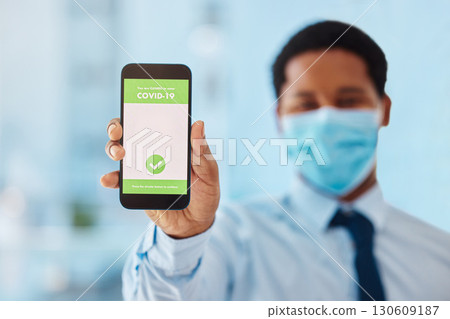 QR code, scan and phone with online covid vaccine certificate by businessman showing mobile screen. App, hand and digital passport of an employee or tourist as new normal travel closeup QR code, scan and phone with online covid vaccine certificate by businessman showing mobile screen. App, hand and digital passport of an employee or tourist as new normal travel closeup 130609187
