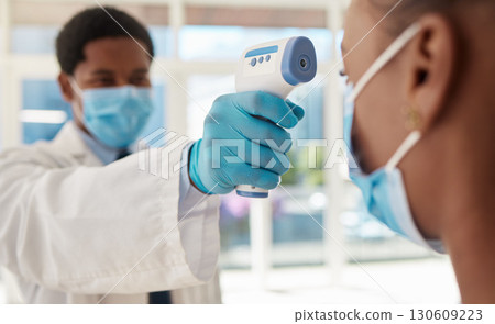 Doctor, patient and Covid, healthcare and thermometer for temperature check zoom with black people in medicine. Face mask, Corona and virus prevention, man and woman in clinic for medical screening 130609223