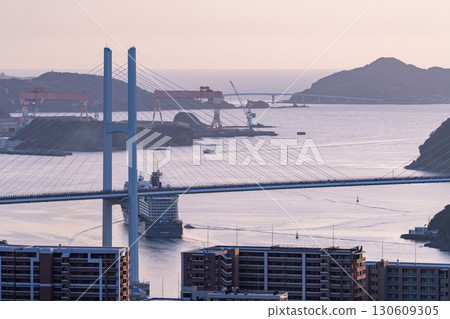 Nagasaki Prefecture: View of Megami Bridge, a luxury cruise ship departing, and Mt. Nabekanmuri 130609305