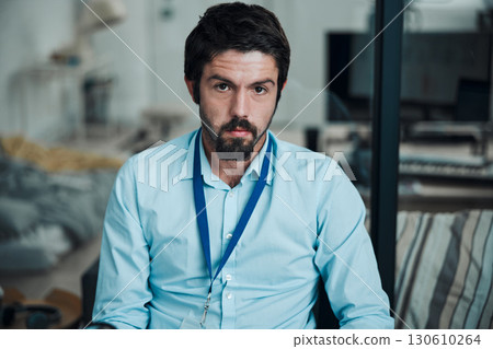 Technician, programmer and portrait of a man in a office for engineering service, maintenance or repairs. Information technology, professional and serious male IT engineer working in a workshop. Technician, programmer and portrait of a man in a office for engineering service, maintenance or repairs. Information technology, professional and serious male IT engineer working in a workshop. 130610264