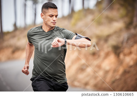 Fitness, smartwatch or man running for exercise, cardio training or workout in nature tracking health stats. Wellness, runner or sports athlete monitoring speed performance, heart rate or progress 130610665