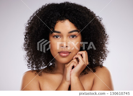 Beauty, skincare and portrait of a black woman with cosmetics isolated on a grey studio background. Serious, young and face of a model with a fresh afro, cosmetology and elegant on a backdrop Beauty, skincare and portrait of a black woman with cosmetics isolated on a grey studio background. Serious, young and face of a model with a fresh afro, cosmetology and elegant on a backdrop 130610745