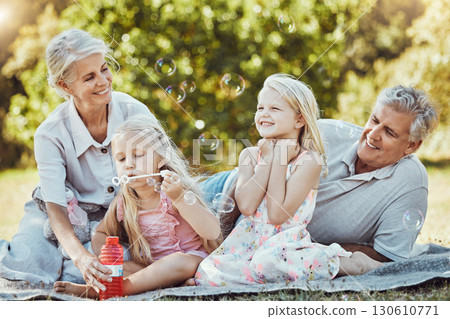 Children, seniors or bonding with bubbles in park, home nature picnic or house garden in fun, silly or goofy activity. Smile, happy or retirement elderly with kids in family social and soap water toy Children, seniors or bonding with bubbles in park, home nature picnic or house garden in fun, silly or goofy activity. Smile, happy or retirement elderly with kids in family social and soap water toy 130610771