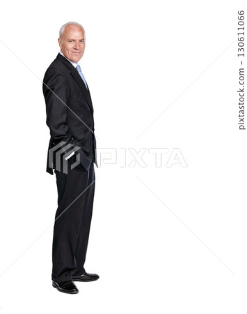 Portrait of a senior business man smiling and happy while standing isolated against a studio white background. Caucasian, mature and executive corporate CEO or professional employee 130611066