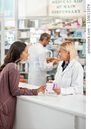 Wellness, health and happy pharmacy customer at store counter for medicine expertise with smile. Pharmaceutical advice and opinion of woman pharmacist helping girl with medication information. 130611074