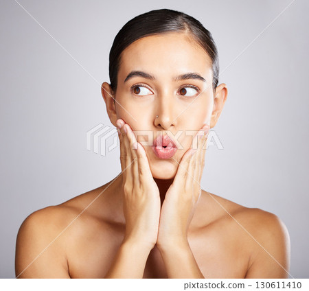 woman, beauty and kiss face for skincare wellness, facial dermatology and luxury natural skin glow in spa studio. Young model, calm hand gesture and healthy cosmetics treatment or relax body care woman, beauty and kiss face for skincare wellness, facial dermatology and luxury natural skin glow in spa studio. Young model, calm hand gesture and healthy cosmetics treatment or relax body care 130611410