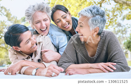 Wellness, happy and retirement women friends laugh in park for group bonding and relaxing lifestyle. Funny joke and smile of senior people in interracial friendship in nature together. Wellness, happy and retirement women friends laugh in park for group bonding and relaxing lifestyle. Funny joke and smile of senior people in interracial friendship in nature together. 130611525