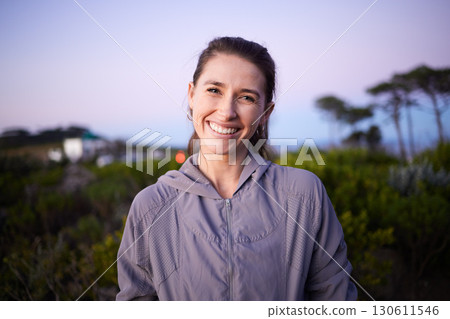 Happy, sunset and portrait of a woman in a park during dusk for peace, calm and zen. Adventure, hike and face of a girl on a walk for fitness, summer cardio and relaxing during dawn in nature Happy, sunset and portrait of a woman in a park during dusk for peace, calm and zen. Adventure, hike and face of a girl on a walk for fitness, summer cardio and relaxing during dawn in nature 130611546