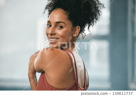 Black woman, smile portrait and exercise stretching for fitness workout, wellness training and happy cardio runner. in gym. African athlete, sports happiness and running warm up or motivation success Black woman, smile portrait and exercise stretching for fitness workout, wellness training and happy cardio runner. in gym. African athlete, sports happiness and running warm up or motivation success 130611737