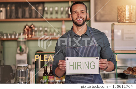 Small business, man or business owner with a hiring sign for job vacancy offer in cafe or coffee shop. Boss, marketing or happy entrepreneur smiles with an onborading recruitment message in store Small business, man or business owner with a hiring sign for job vacancy offer in cafe or coffee shop. Boss, marketing or happy entrepreneur smiles with an onborading recruitment message in store 130611764