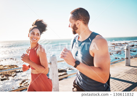 Running, fitness and sea with a sports couple outdoor during summer for cardio or endurance exercise. Health, training and ocean with a man and woman runner on a promenade for a workout together 130611832