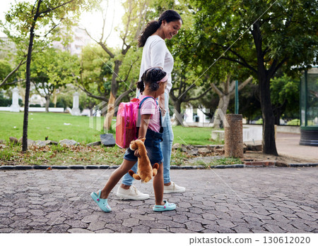 Mother, daughter and walking in a park, relax and bonding while holding hands and talking. Family, black woman and girl with sweet bond of love, enjoying and nature, parenthood and peaceful and day 130612020