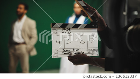 Person, producer and hands with clapperboard on set for take, action or camera roll in production. Closeup, director or assistant with movie slate for film making, videography edit or start scene Person, producer and hands with clapperboard on set for take, action or camera roll in production. Closeup, director or assistant with movie slate for film making, videography edit or start scene 130612337