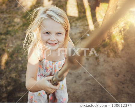 Child, portrait or playing rope in park, nature garden or house backyard on holiday, vacation or summer break. Jungle gym exercise or fun game for smile, happy kid or girl top view in energy climbing 130612374