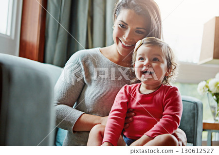 Relax, happy and smile with mother and baby on sofa for bonding, quality time and child development. Growth, support and trust with mom and daughter in family home for health, connection and care 130612527