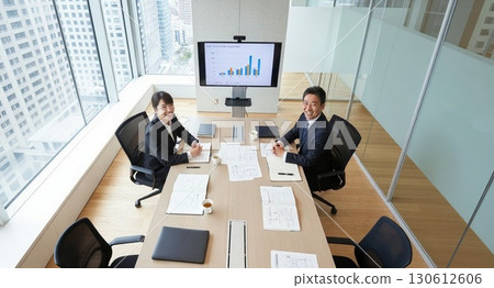 Businessmen meeting in a conference room 130612606