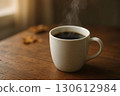 Steaming hot coffee 130612984