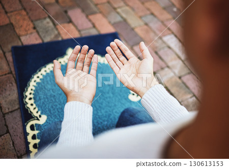 Hands, islam and praying in worship to Allah, god or creator on salah mat making dua on the floor. Hand of islamic man in pray for muslim religion, spiritual or respect for belief or culture outside 130613153