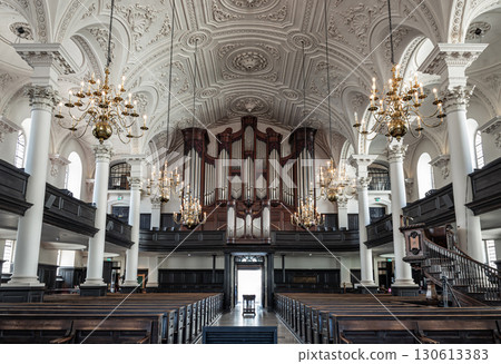 St Martin-in-the-Fields with the central pathway leading to the main entrance/exit at the far end of the nave and The prominent organ. St Martin-in-the-Fields with the central pathway leading to the main entrance/exit at the far end of the nave and The prominent organ. 130613383