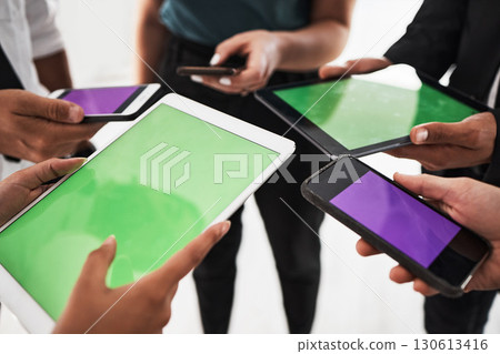 Hands, green screen and mockup with a business team in studio isolated on a white background for communication or networking. Tablet, phone and technology with an employee group on blank space 130613416