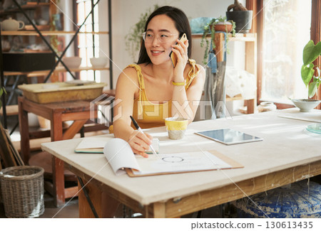 Phone call, illustration and Asian woman for creative startup in planning, conversation and talking to client. Communication, network and girl with graphic design, drawing and notebook for business Phone call, illustration and Asian woman for creative startup in planning, conversation and talking to client. Communication, network and girl with graphic design, drawing and notebook for business 130613435