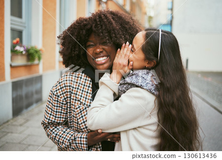 Women, laughing or whispering secret in city street, road or urban London for gossip, story or news. Smile, happy or friends talking into ear in bonding travel with funny surprise, comic or meme joke Women, laughing or whispering secret in city street, road or urban London for gossip, story or news. Smile, happy or friends talking into ear in bonding travel with funny surprise, comic or meme joke 130613436
