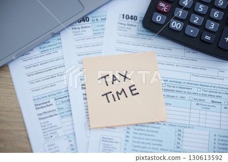 Tax time, accounting paperwork and form for government law compliance, file income revenue return or self assessment. Calculator, sticky note and finance audit form for financial payment and taxes Tax time, accounting paperwork and form for government law compliance, file income revenue return or self assessment. Calculator, sticky note and finance audit form for financial payment and taxes 130613592